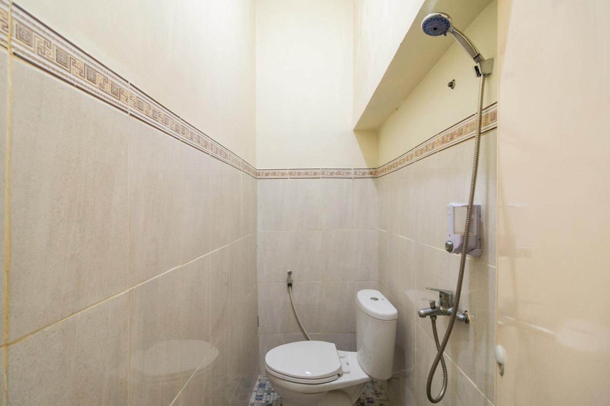 Reddoorz Syariah Near Pasar Aur Kuning Hotell Bukittinggi Rom bilde